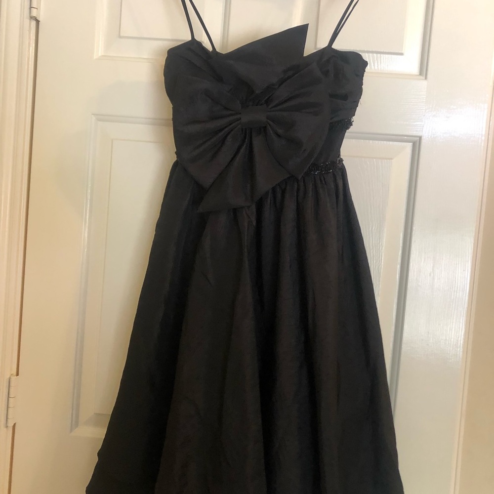 ABS cocktail dress with bow in the front!